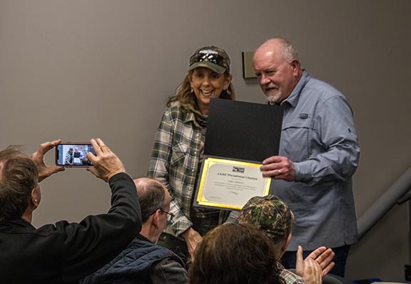 Julie Gibbery receives Presidential Citation award for her work as Membership Community Chairman for the Southern Appalachian Nature Photographers association.